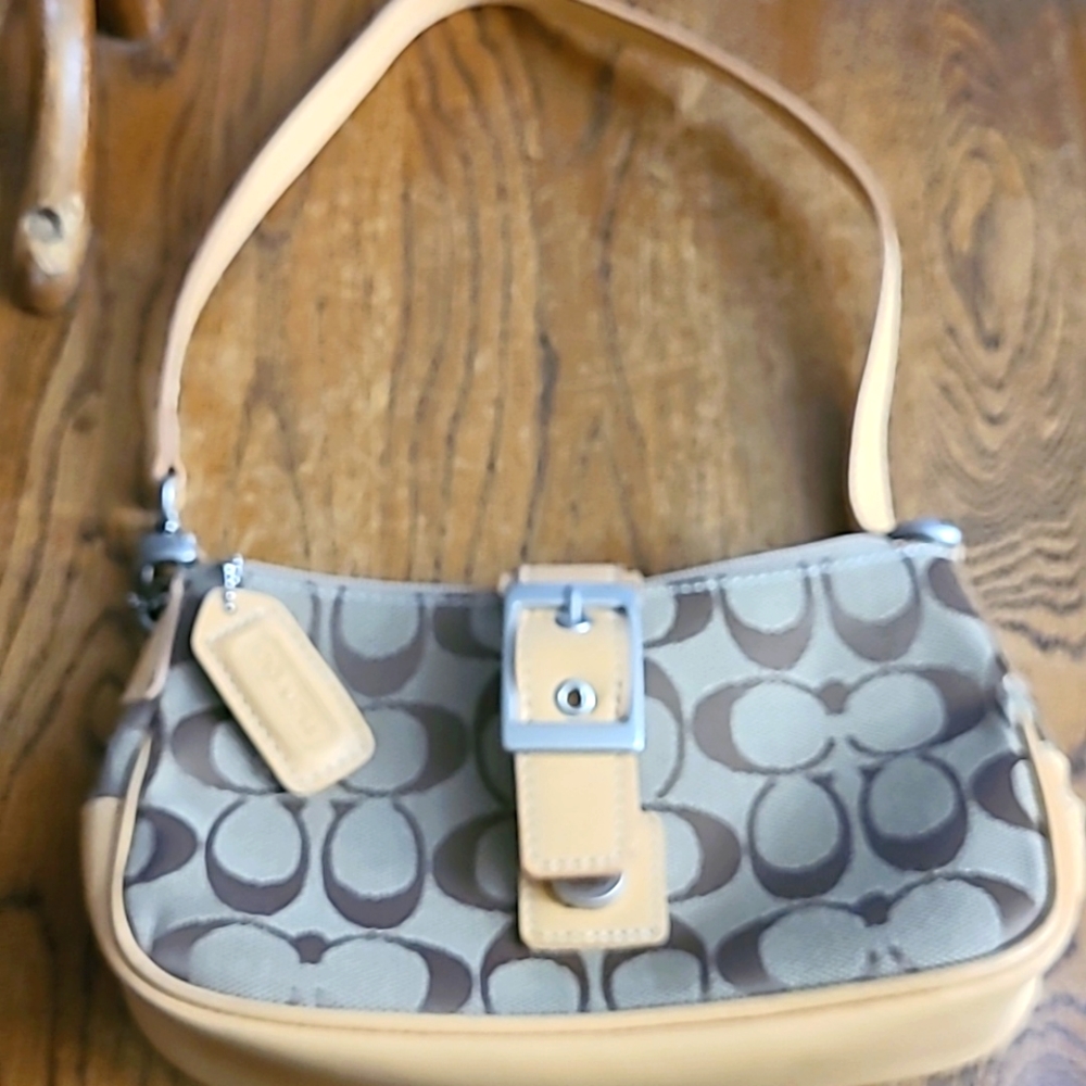 NEW POCKETBOOK. Measures width 9 1/2"  height 5 1/2"